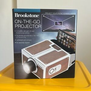 Brookstone On-The-Go Projector, Cell Phone Projector Apple Android